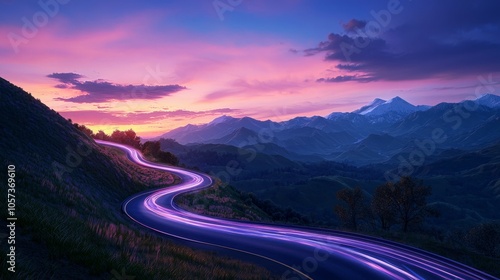 Serpentine Road Through Mountain Range at Dusk