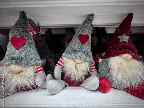 Fotografie view of stuffed Christmas gnomes with their pointy hats and white beards for the