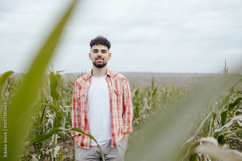 Man standing in cornfield Man standing in cornfield