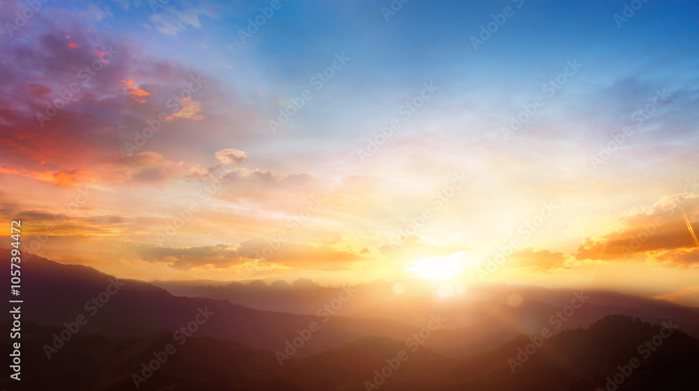 Panorama of beautiful sunset over the mountain range with clouds in the sky
Panorama of beautiful sunset over the mountain range with clouds in the sky