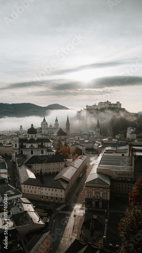 Salzburg magical morning scene with fog during autumn sunrise, Salzburger Land, Austria