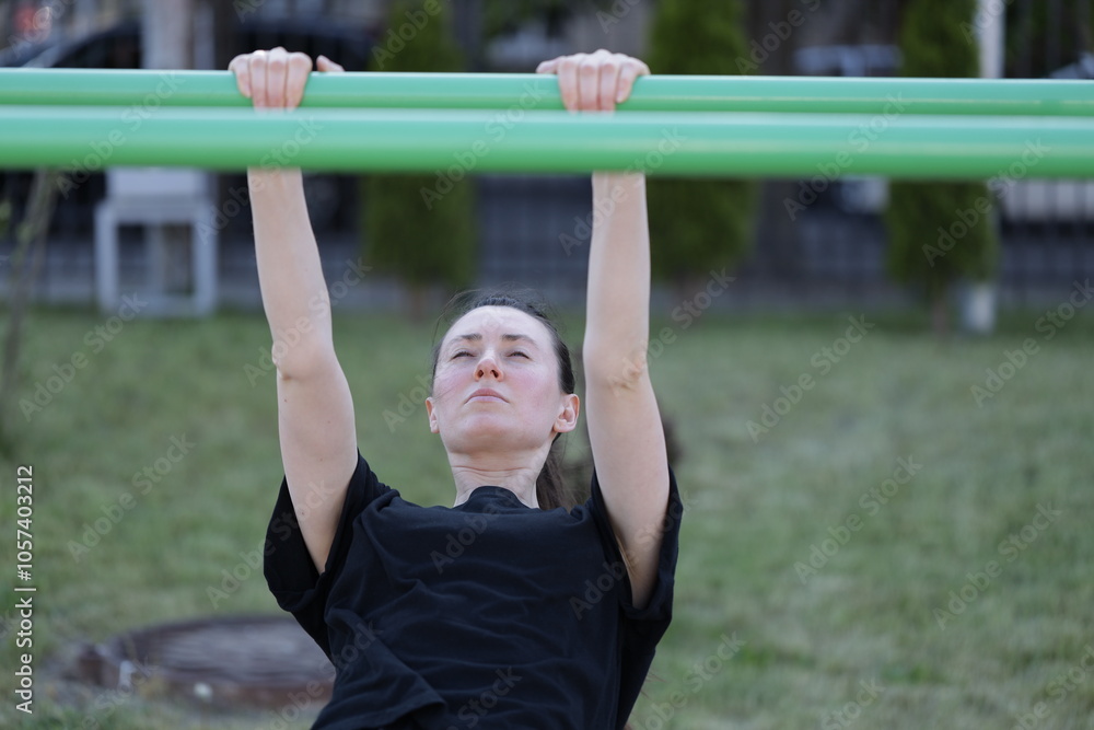 Woman doing workout exercises outside