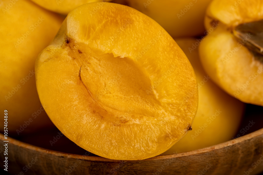 ripe soft apricot fruits on the cutting board