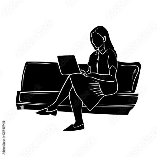 Silhouette of a young woman relaxing on a sofa while playing with a labtop