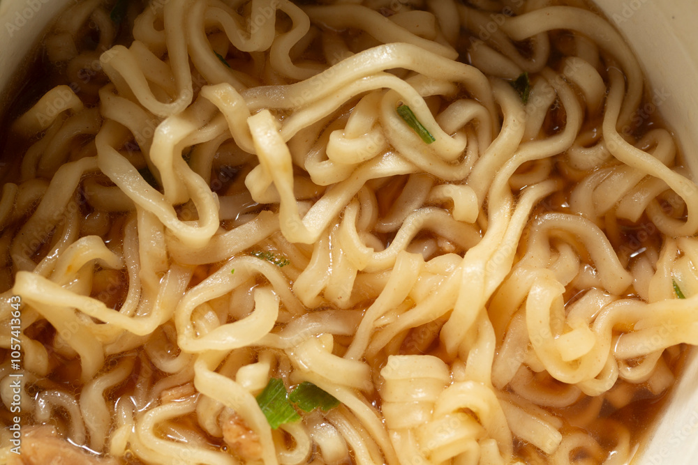 A top down view of instant ramen noodles, as a background. A top down view of instant ramen noodles, as a background.
