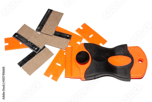 Naklejka Plastic scraper with replaceable blades on a white background.A scraper for cleaning surfaces.