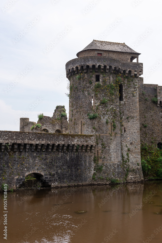The Coigny tower of the Fougeres medieval castle with the Le Nançon river in foreground (Fougeres, Ille-et-Vilaine, Bretagne, France) The Coigny tower of the Fougeres medieval castle with the Le Nançon river in foreground (Fougeres, Ille-et-Vilaine, Bretagne, France)
