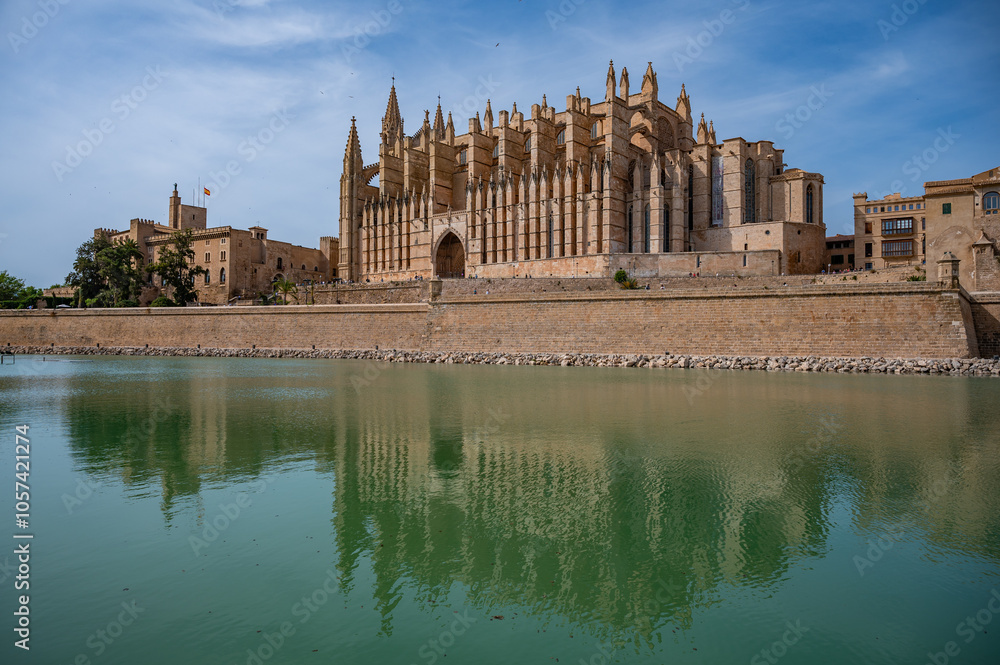 Cathedral of Santa Maria of Palma, La Seu, with reflection on the lake in front. Palma de Mallorca, Spain Cathedral of Santa Maria of Palma, La Seu, with reflection on the lake in front. Palma de Mallorca, Spain