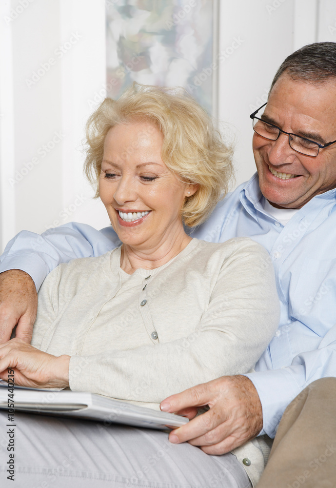 Couple on Sofa with Book Couple on Sofa with Book