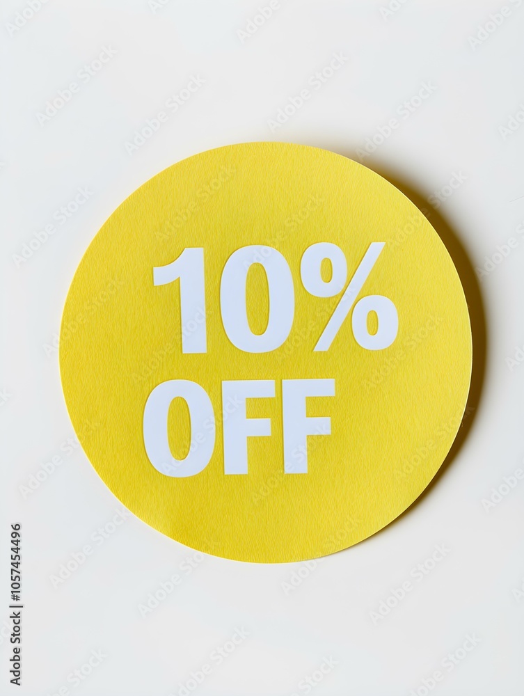 White '10% OFF' Text on a Light Yellow Round Paper Note. White Background White '10% OFF' Text on a Light Yellow Round Paper Note. White Background