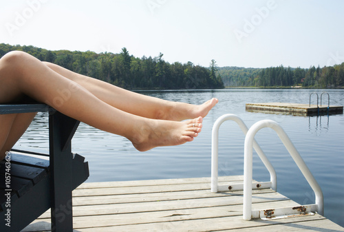 Woman Relaxing on Dock photo