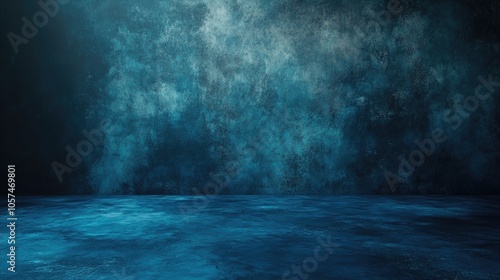 Dark and soft blue abstract gradient background with a cement wall and studio room effect