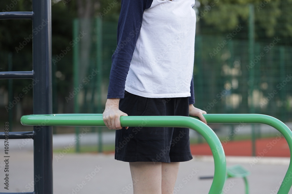 Fototapeta premium Woman exercising or doing workout session outside