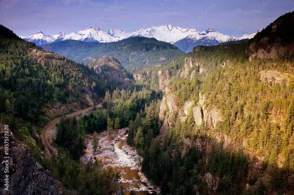Cheakamus River flowing in the Tantalus Range of the Coast Mountains of BC, Canada; British Columbia, Canada Cheakamus River flowing in the Tantalus Range of the Coast Mountains of BC, Canada; British Columbia, Canada