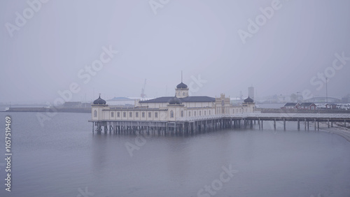 Building in the sea on a foggy day