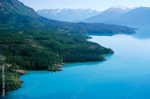 Blue water of Atlin Lake in Atlin Provincial Park, BC, Canada; British Columbia, Canada