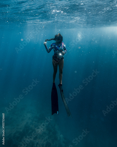 Female Free Diver With Seals in Baja California Sur Mexico