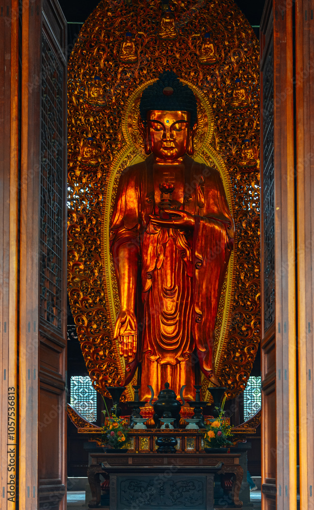 old Chinese Buddhist statue in Qita Temple (The Seven Pagodas Temple) in early summer at Yinzhou, Ningbo, China old Chinese Buddhist statue in Qita Temple (The Seven Pagodas Temple) in early summer at Yinzhou, Ningbo, China