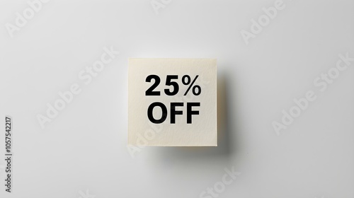 Black '25% OFF' Text on a Ivory Square Paper Note. White Background with Copy Space