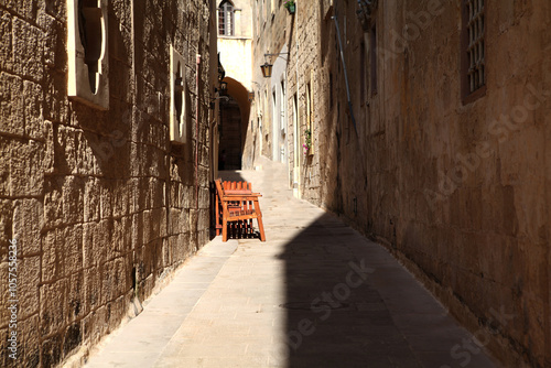 Quiet, empty cobbled street in a small European tourist city