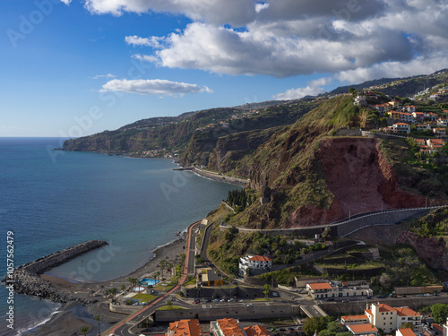 View of the town, waterfront and coastline of Ribeira Brava on the island of Madeira, Portugal; Ribeira Brava, Madeira, Portugal photo