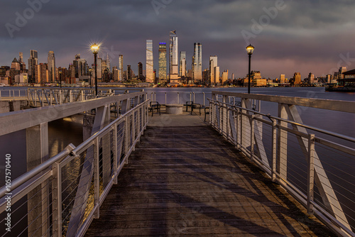 Midtown Manhattan skyline at twilight viewed from Weehawken Pier, New Jersey, USA; Weehawken, New Jersey, United States of America photo