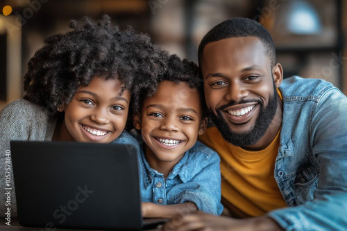 Family Watching Laptop And Laughing