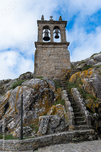 tower of the church in muxia, spain photo