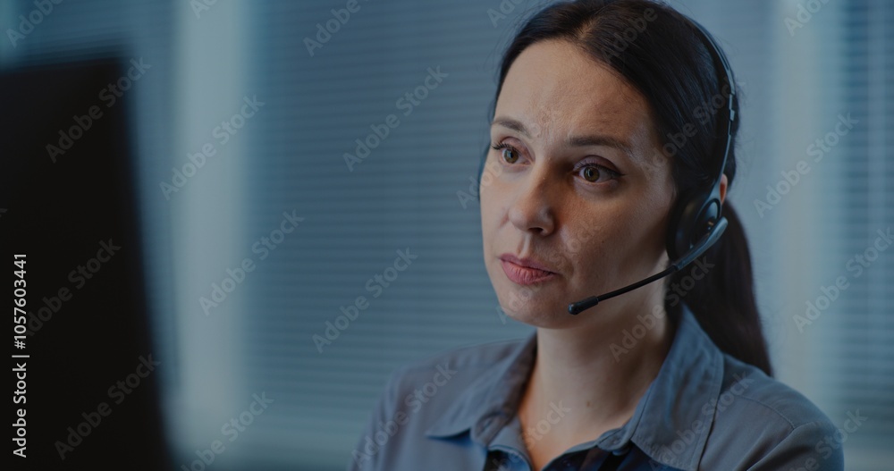 Modern call center office of psychological helpline: Portrait of Caucasian female hotline operator talking on headset, consulting person online, providing mental health help. Emotional support concept Modern call center office of psychological helpline: Portrait of Caucasian female hotline operator talking on headset, consulting person online, providing mental health help. Emotional support concept