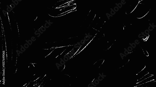 Grunge noise on a black background for overlays, Retro cinema film effect with white scratches overlays and alpha channel.
