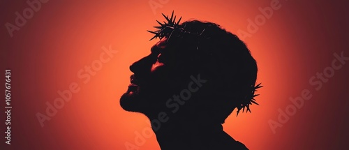 Introspective image of a man wearing a crown of thorns, illuminated by soft, dim light, evoking emotions of sacrifice, faith, and redemption