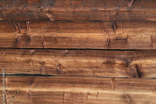 The old wood texture with natural patterns as a background.