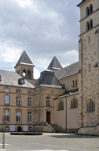 Monastery Yard and Towers of St Willibrordus Cathedral in Echternach, Luxembourg photo