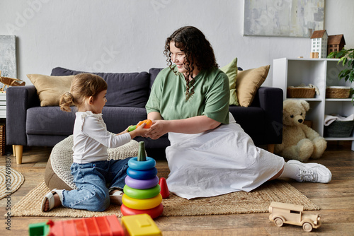 A mother and her daughter enjoy quality time together, engaging in playful activities at home. photo