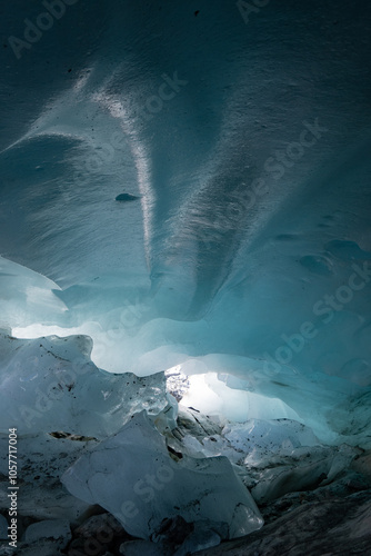 Ice cave in the glacier of Langgletscher at Lötschental in Wallis, Switzerland photo