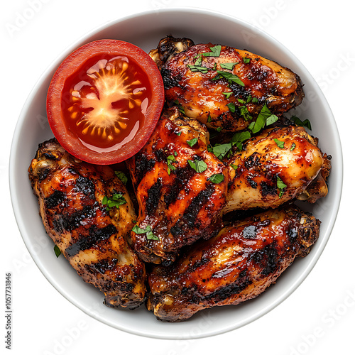 Grilled Spicy chicken legs with soy sauce on a transparent background. Grilled chicken legs with sauce and tomato. photo