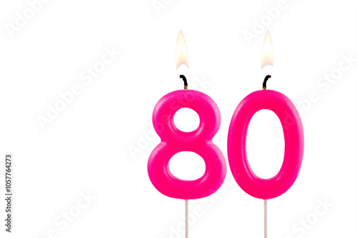 Pink number 80 birthday candle on white background