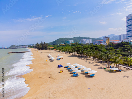 City beach. Nha Trang is a resort city in Vietnam. It's a sunny day. Shooting from a drone.