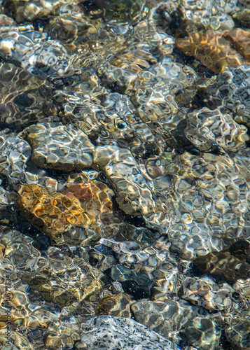 Pure lake water and rocks, san carlos de bariloche, rio negro, argentina photo