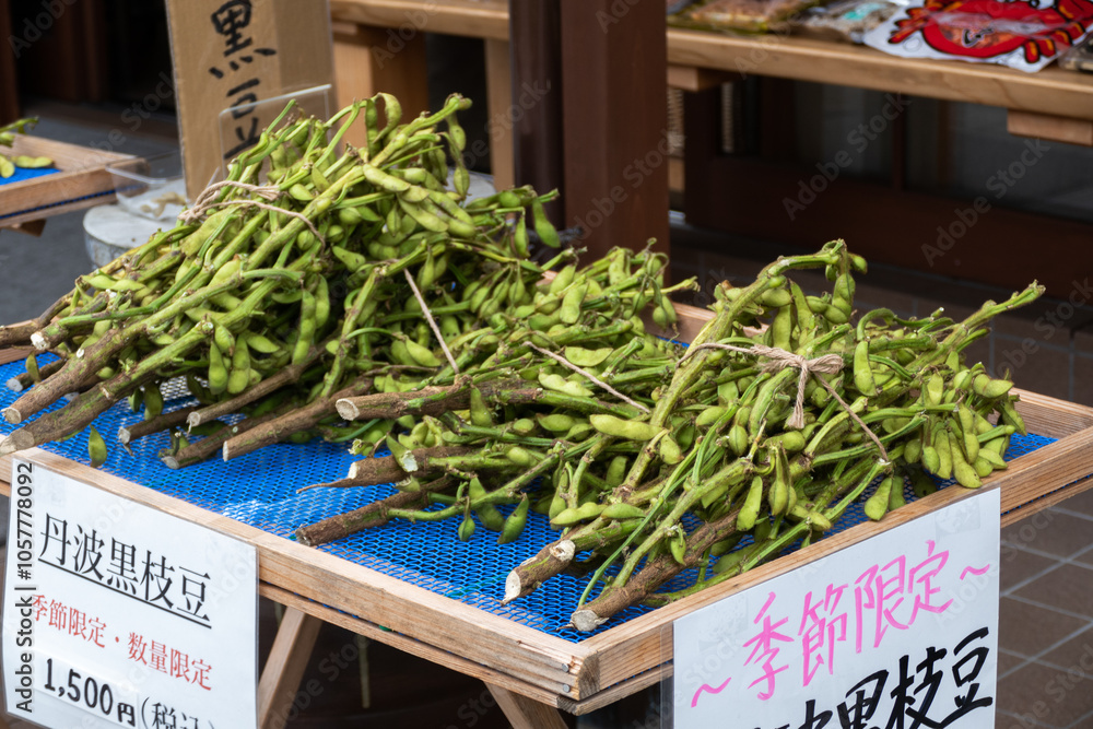 Edamame in local market, is an East Asian dish prepared with immature soybeans in the pod. The pods are boiled or steamed and may be served with salt or other condiments