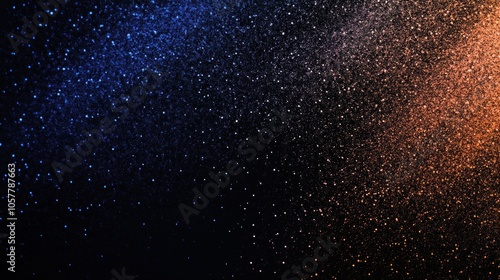 Abstract background with blue and orange particles on a black background.