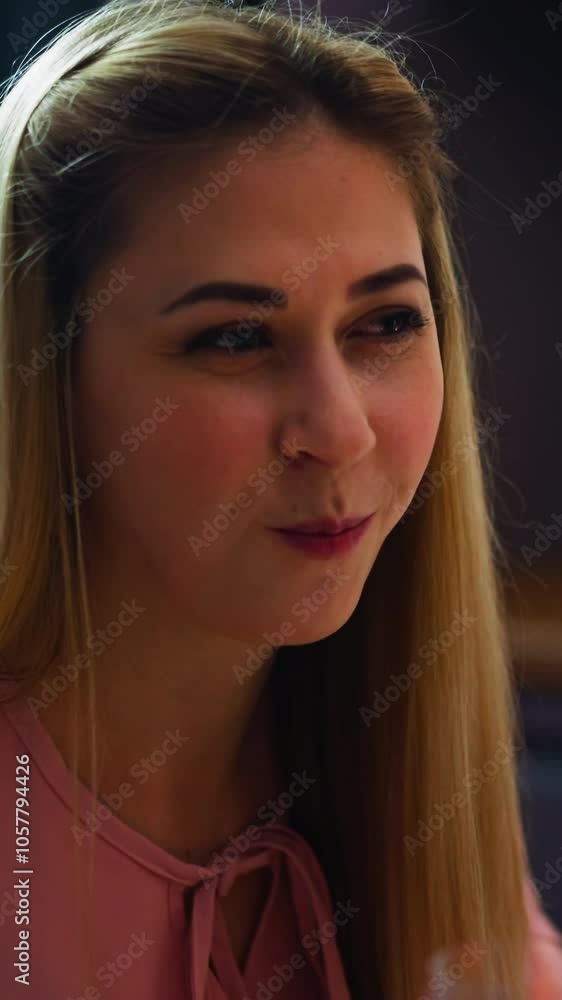 Pretty long haired lady coquettishly looks at friend eating delicious salad during romantic supper in kitchen at home close view slow motion Pretty long haired lady coquettishly looks at friend eating delicious salad during romantic supper in kitchen at home close view slow motion