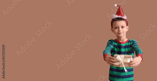 Little boy in Christmas paj...