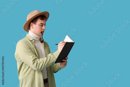 Young writer with notebook ...