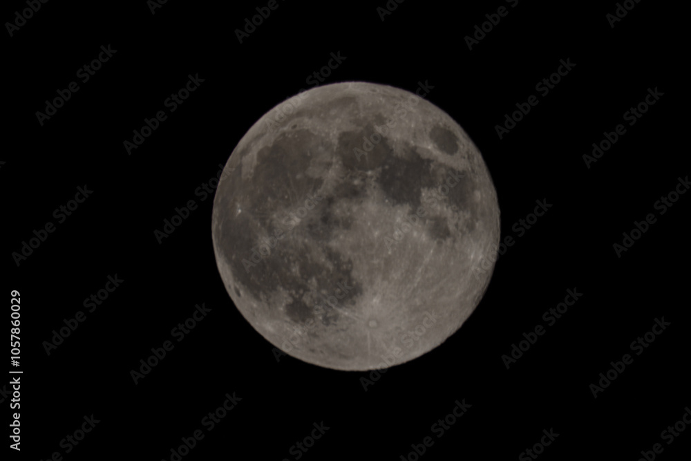 The full moon surface close up that lights up in the night. The full moon surface close up that lights up in the night.