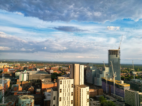 High Angle View of iconic Buildings at Central Greater Manchester City Centre and Tall Buildings During Golden Hour of Sunset over England UK. May 5th, 2024.