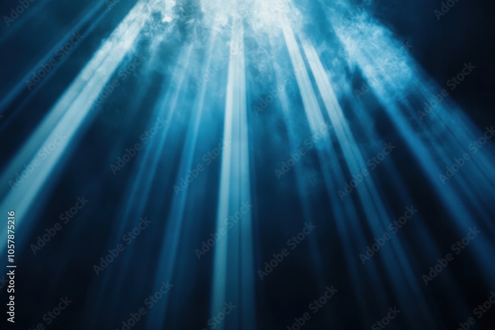 Display of azure vertical light beams against a dim background