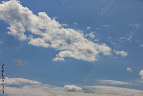 Obraz na płótnie Serene sky with fluffy white clouds on bright sunny day, peaceful nature backdrop, cloudscape tranquility concept w salonie