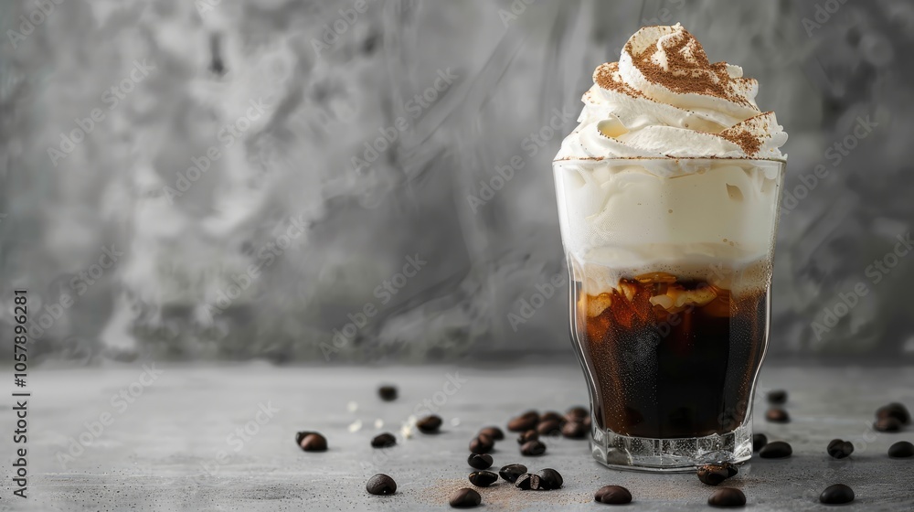 Traditional Korean coffee dessert with whipped foam and milk against gray backdrop. Traditional Korean coffee dessert with whipped foam and milk against gray backdrop.