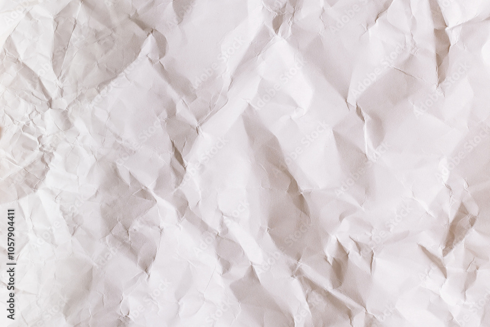 Obraz premium Crumpled white paper background.